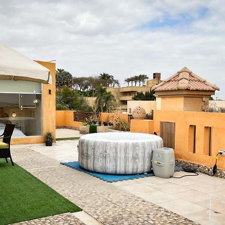 דירות Giza Boho Getaway With Pyramids View & Jacuzzi מראה חיצוני תמונה