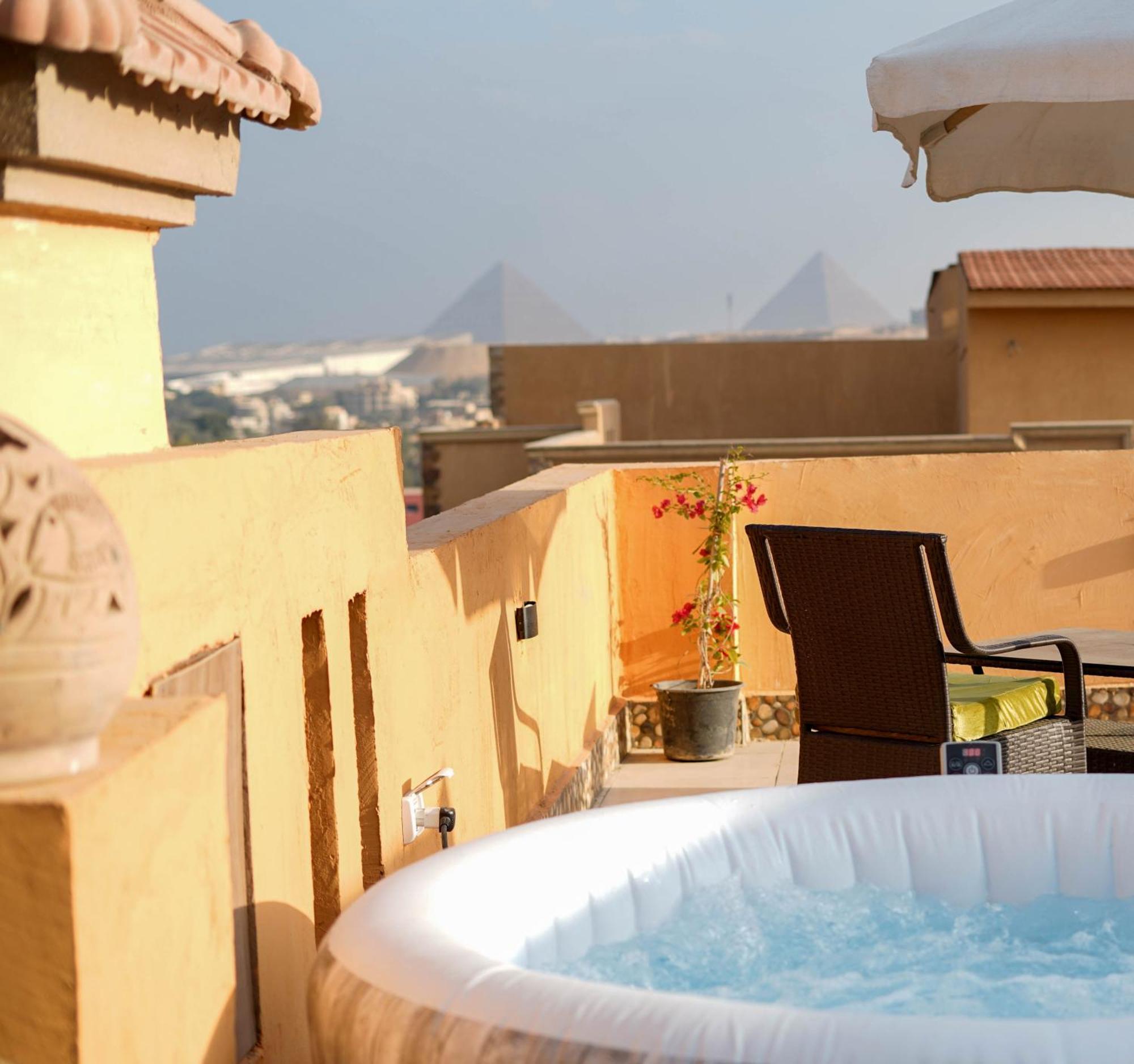 דירות Giza Boho Getaway With Pyramids View & Jacuzzi מראה חיצוני תמונה
