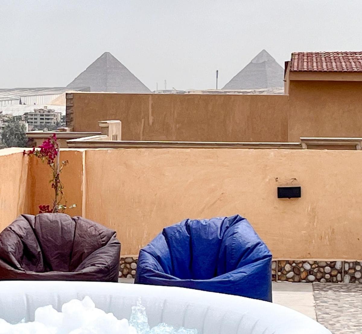 דירות Giza Boho Getaway With Pyramids View & Jacuzzi מראה חיצוני תמונה