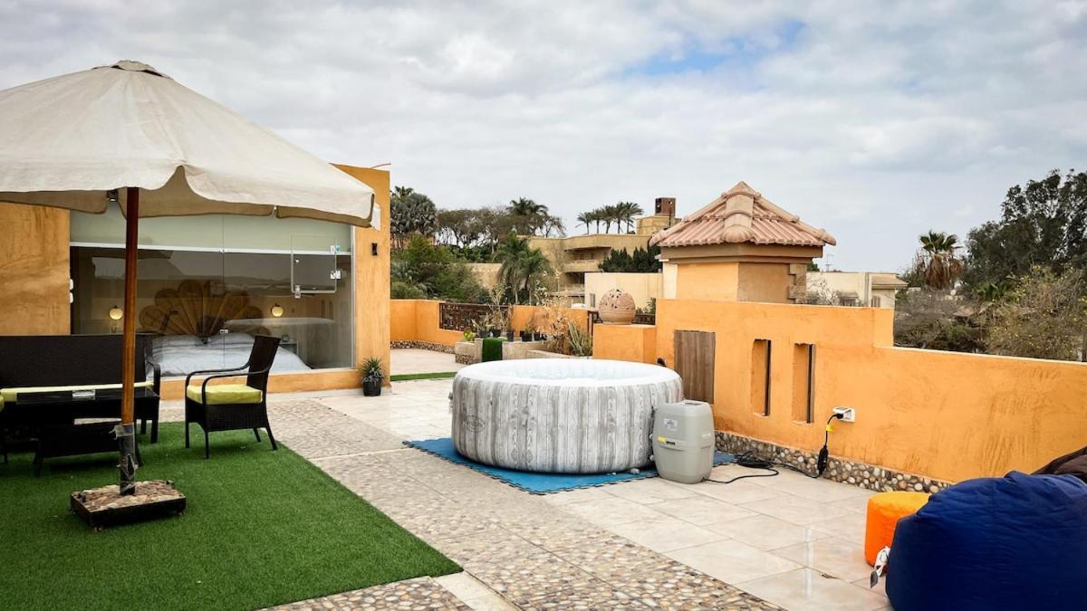 דירות Giza Boho Getaway With Pyramids View & Jacuzzi מראה חיצוני תמונה