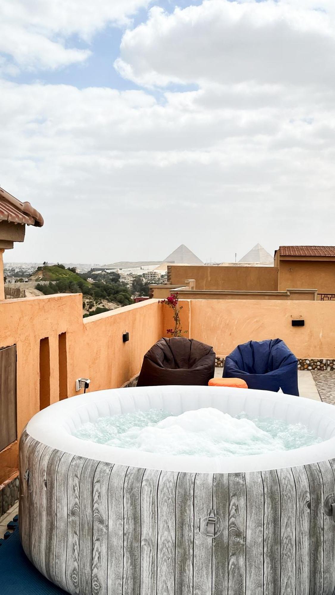 דירות Giza Boho Getaway With Pyramids View & Jacuzzi מראה חיצוני תמונה